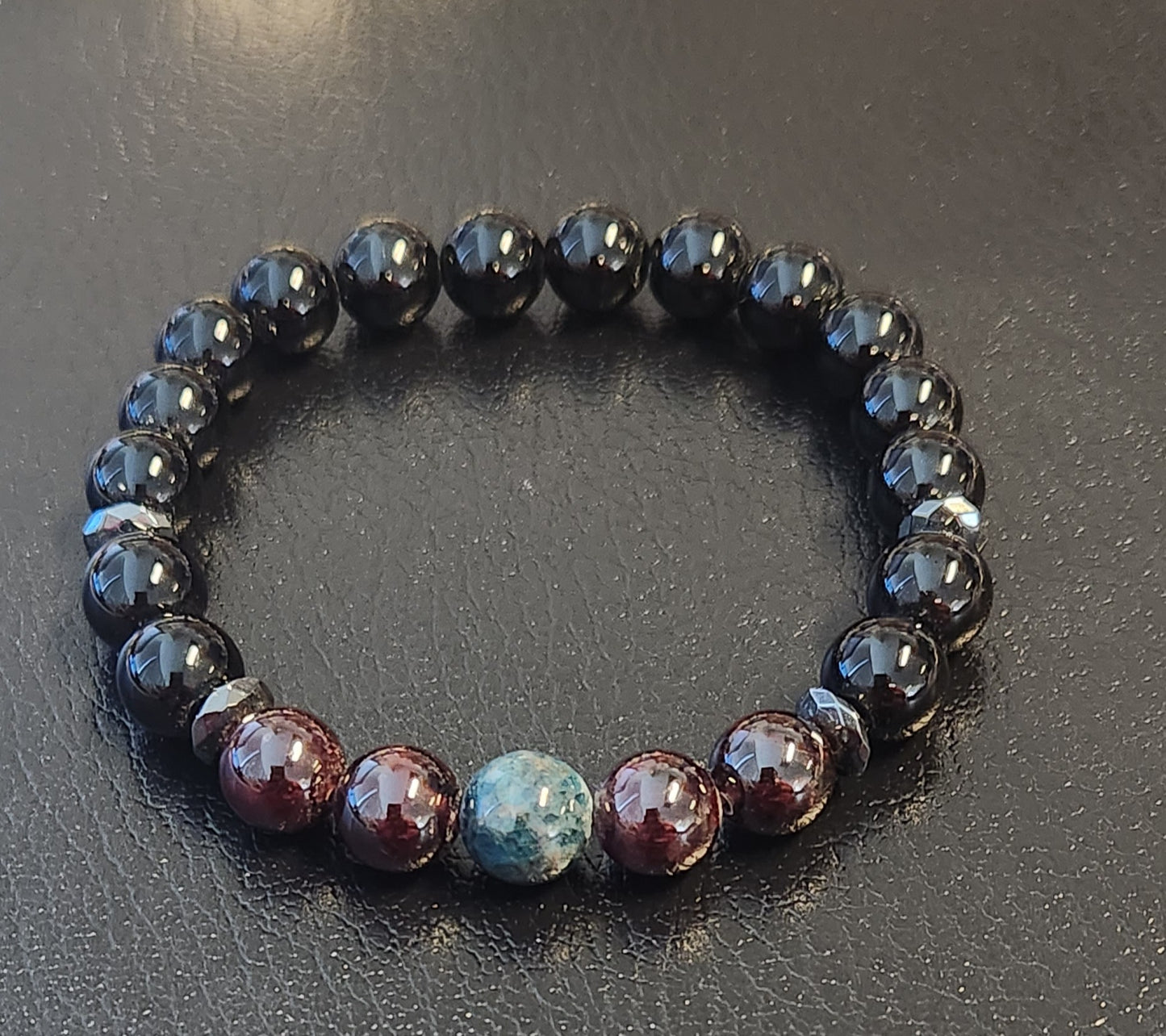 Apatite, Garnet and Onyx bracelet